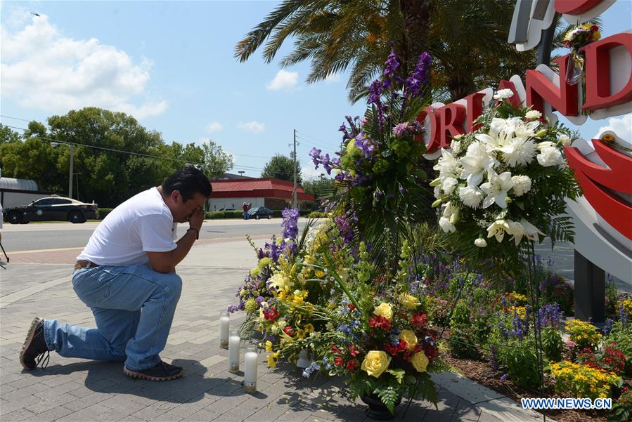 A man cries outside the Orlando Regional Medical Centre where the wounded are treated in Orlando, Florida, the United States, June 13, 2016. 