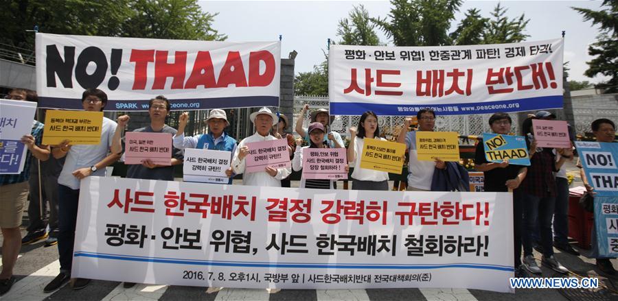 Local residents take part in a protest against the decision to deploy the Terminal High Altitude Area Defense (THAAD), in Seoul, South Korea, July 8, 2016. 