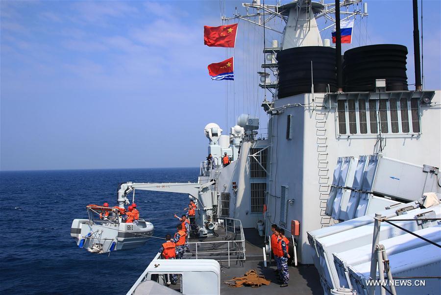 Chinese and Russian fleets conducted joint operation exercise off Guangdong Province in the South China Sea during the 'Joint Sea 2016' drill on Friday. 