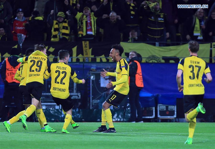 Pierre-Emerick Aubameyang (2nd R) of Borussia Dortmund celebrates scoring during the UEFA Champions League Round of 16 second leg match between Borussia Dortmund and SL Benfica at Signal Iduna Park in Dortmund, Germany, on March 8, 2017. 