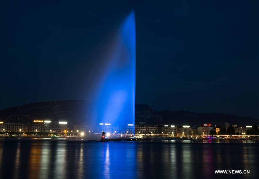 Grand fountain of Geneva illuminates blue color