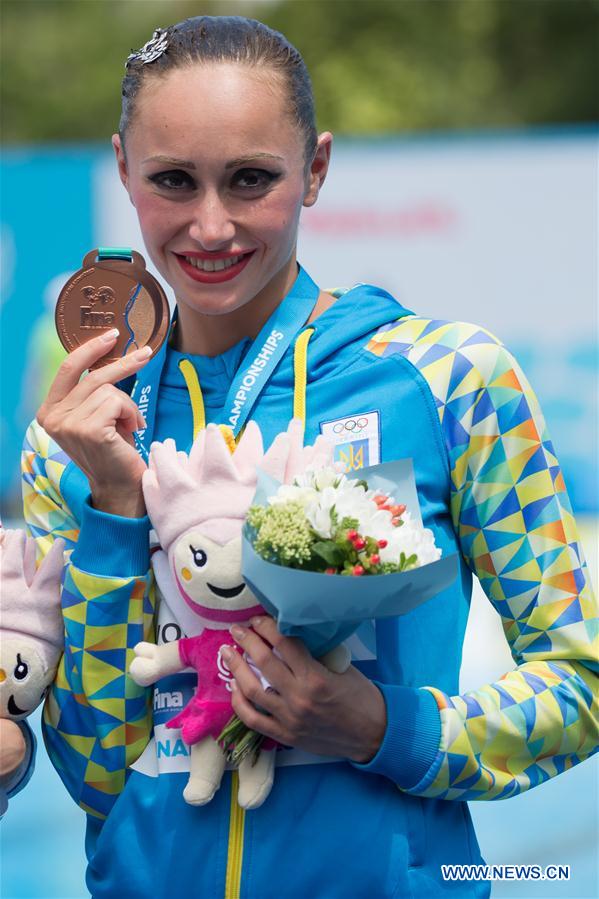 sia's Kolesnichenko wins gold at synchronized 
