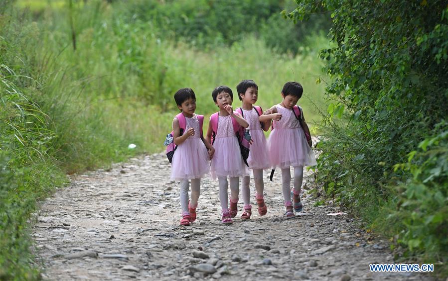 Anti-poverty story of quadruplets family in E China's Jiangxi