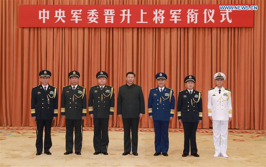 China promotes military anti-graft chief to general