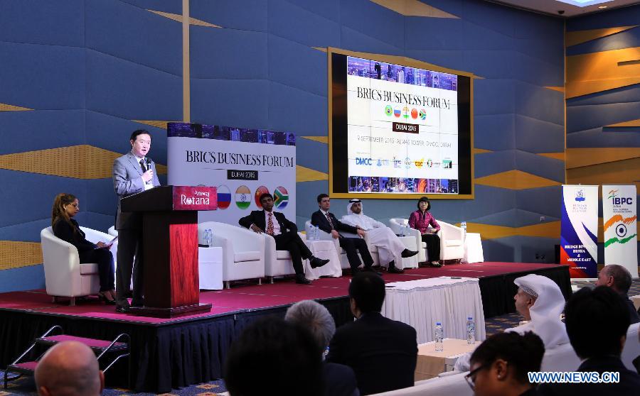 Chinese Ambassador to the United Arab Emirates (UAE) Chang Hua (2nd L) speaks during the BRICS forum held in Dubai, the United Arab Emirates (UAE) on Sept. 9, 2015.