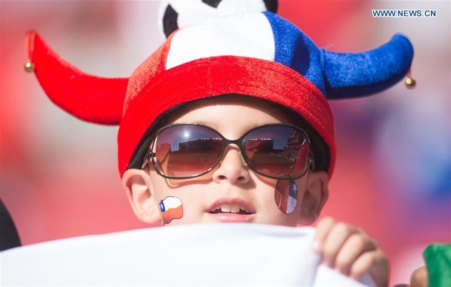 A boy waits for the start of the Copa America Centenario Group D match between Argentina and Chile at the Levi's Stadium in Santa Clara, California, the United States, June 6, 2016. 