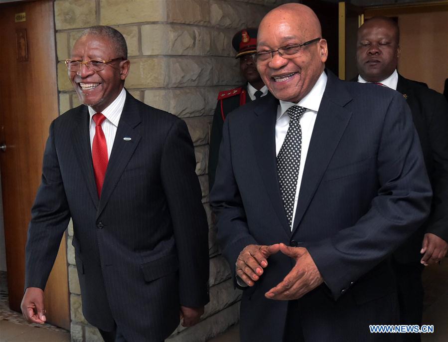 Lesotho's Prime Minister Pakalitha Mosisili (L) welcomes visiting South African President Jacob Zuma in Maseru, Lesotho, on June 9, 2016. 