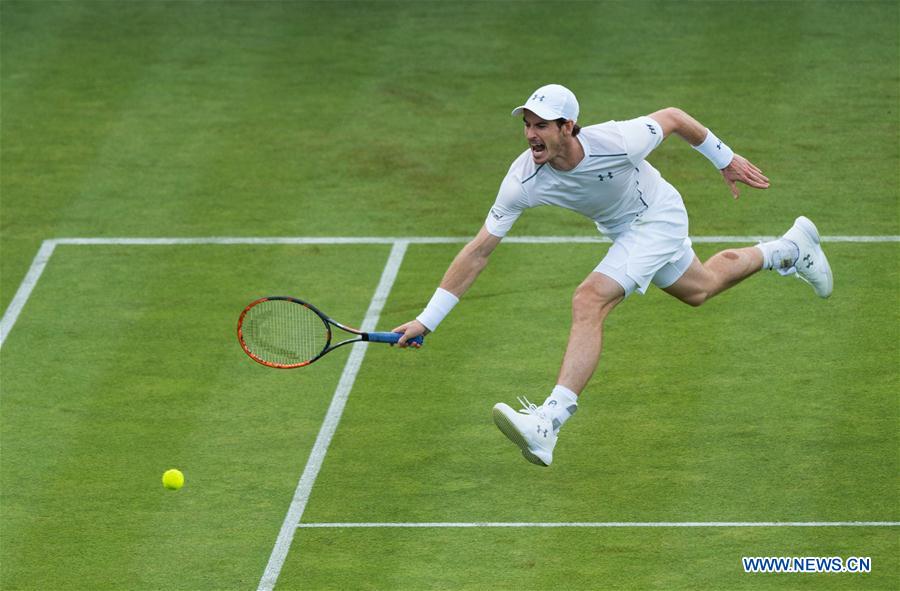 Andy Murray of Britain competes during his singles first round match against Nicolas Mahut of France during day two of the ATP-500 Aegon Championships at the Queen's Club in London, Britain on June 14, 2016.