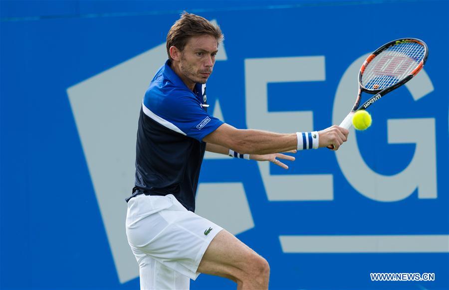 Nicolas Mahut of France competes during his singles first round match against Andy Murray of Britain during day two of the ATP-500 Aegon Championships at the Queen's Club in London, Britain on June 14, 2016. 