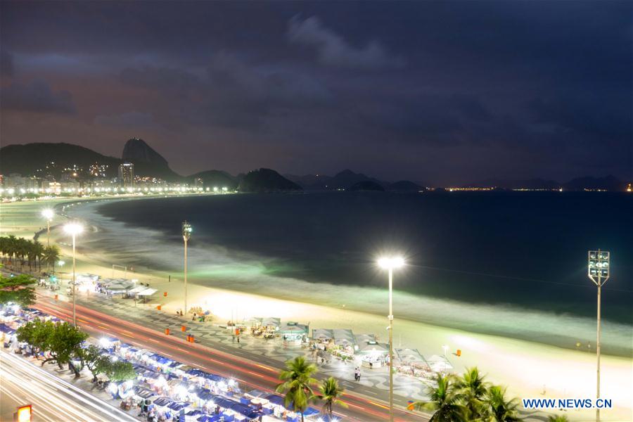 This file photo shows the night view of Copacabana beach in Rio de Janeiro, Brazil on Oct. 6, 2013. 