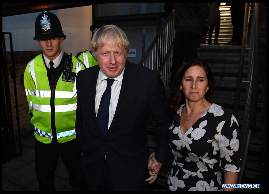 The Former Mayor of London Boris Johnson (L) and his wife Marina vote for the EU Referendum in central London, Britain, on June 23, 2016. 