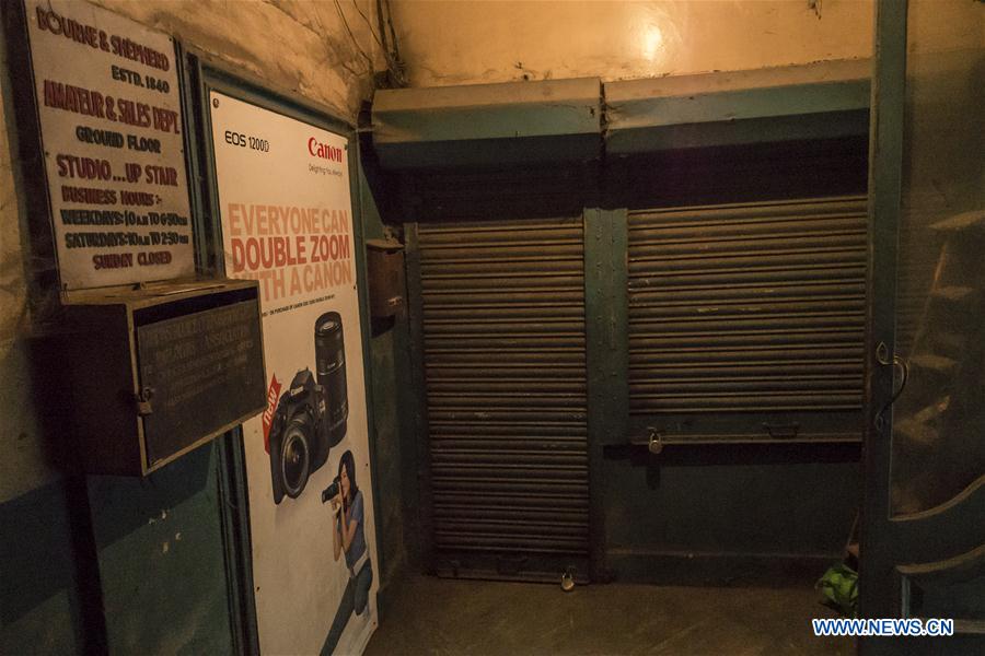 Photo taken on June 24, 2016 shows a bulletin board of the closed photographic studio Bourne and Shepherd in Kolkata, capital of eastern Indian state West Bengal.