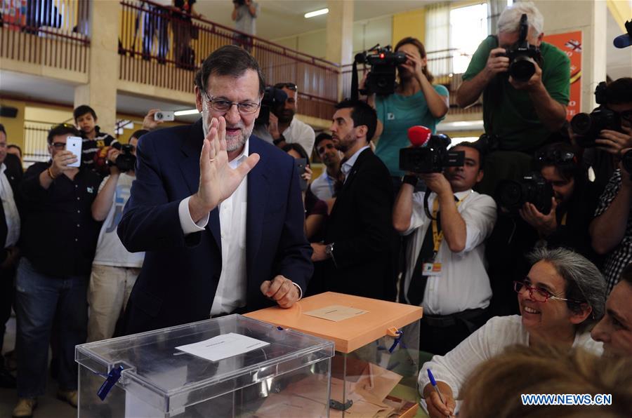 Mariano Rajoy, acting Spanish Prime Minister and the leader of the People's Party (PP), speaks after casting his vote at Bernadette School polling station in Madrid, Spain, on June 26, 2016.