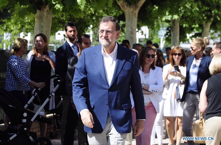 Mariano Rajoy, acting Spanish Prime Minister and the leader of the People's Party (PP), speaks after casting his vote at Bernadette School polling station in Madrid, Spain, on June 26, 2016.