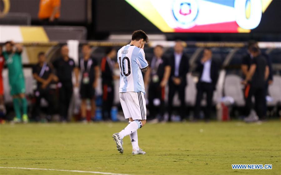 Argentina's Lionel Messi reacts after missing a penalty kick during the penalty shootout of 2016 Copa America Centenario soccer tournament Final at the Metlife Stadium in New Jersey, the United States on June 26, 2016