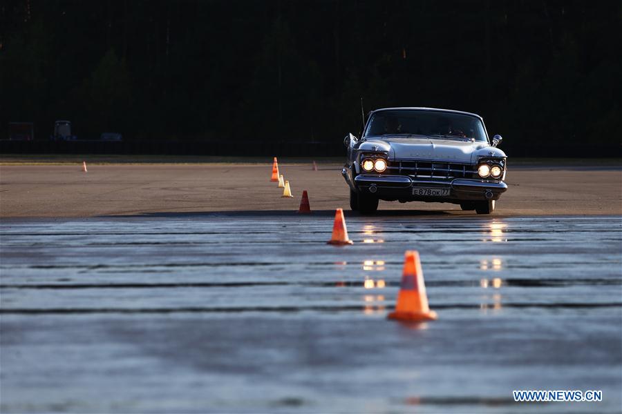 A car is seen during 'Bosch Moskau Klassik rally' racing in Moscow, capital of Russia, on June 26, 2016. 