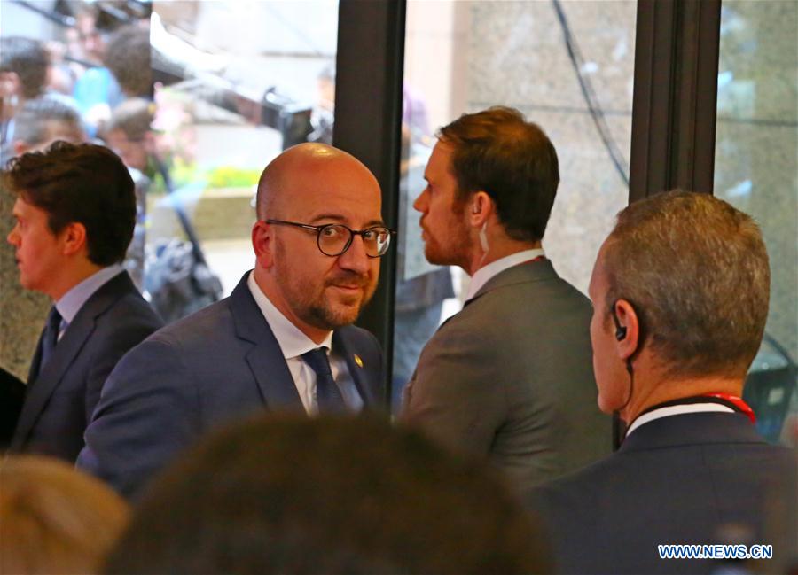 Belgian Prime Minister Charles Michel(2nd L) arrives for the EU summit meeting at Brussels, Belgium on June 28, 2016