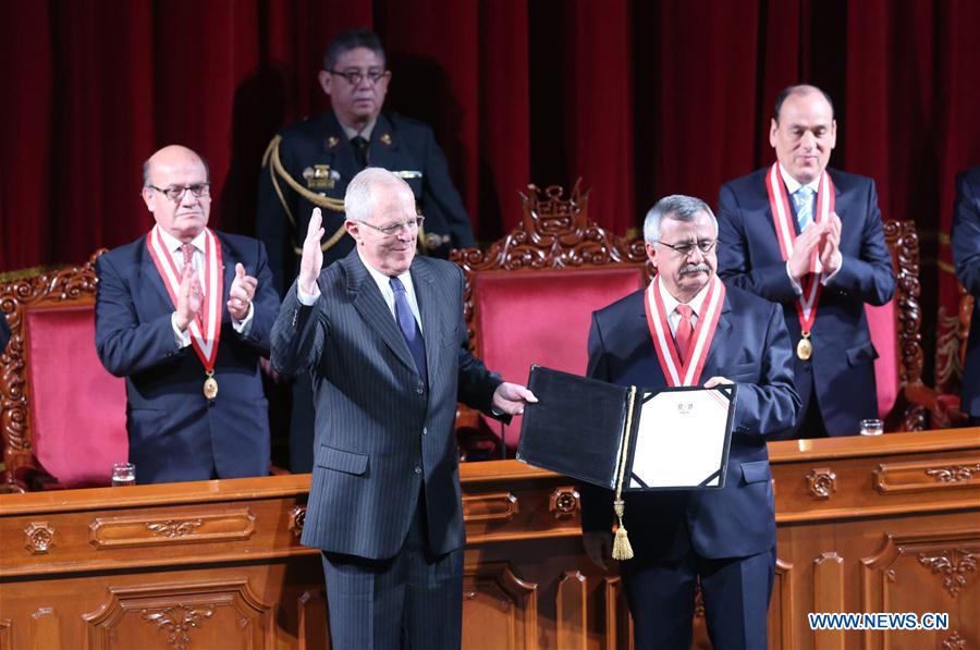 Peruvian President-elect Pedro Pablo Kuczynski (C) addresses a ceremony to receive the presidential credential from the National Elections Board at the Municipal Theater in Lima, capital of Peru, on June 28, 2016.