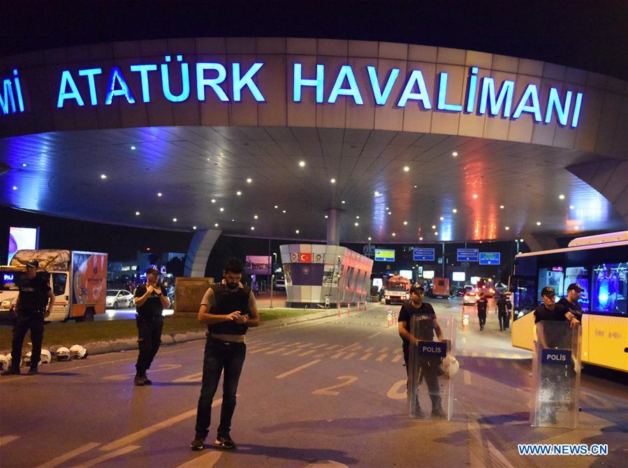 Policemen check staff licenses at the entrance to Ataturk International Airport in Istanbul, Turkey, June 29, 2016.
