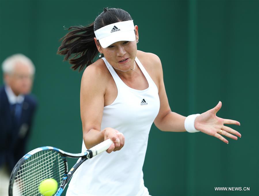 Duan Yingying of China competes during the women's singles second round match with Roberta Vinci of Italy on Day 4 at the Wimbledon Championships 2016 in London, Britain, on June 30, 2016. 