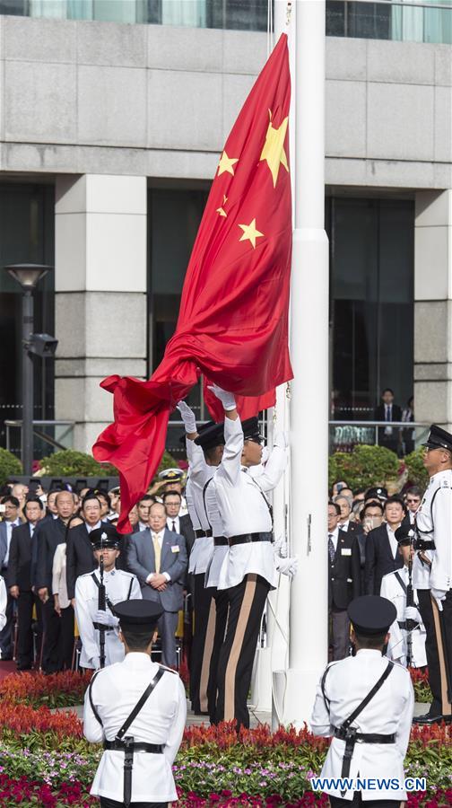 A flag raising ceremony is held at the Golden Bauhinia Square in Hong Kong, south China, July 1, 2016, to celebrate the 19th anniversary of the establishment of Hong Kong Special Administrative Region