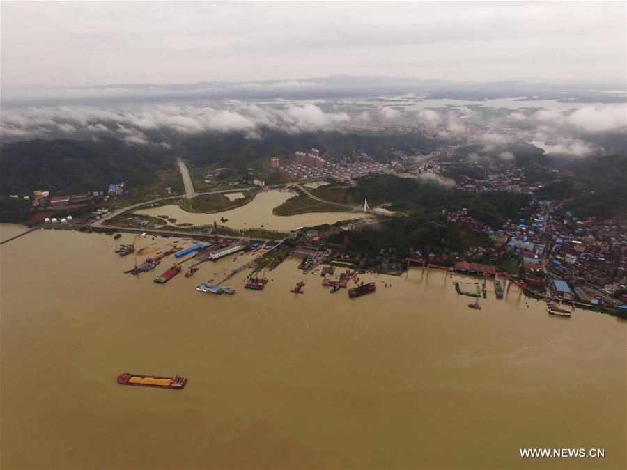 The water level of Poyang Lake rised continuously due to torrential rainfall. Jiangxi provincial hydrological bureau renewed a red alert for flood on Tuesday