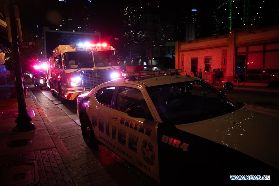 Secutiry force is strengthened in downtown Dallas following the sniper shooting in Dallas, the United States, July 7, 2016.