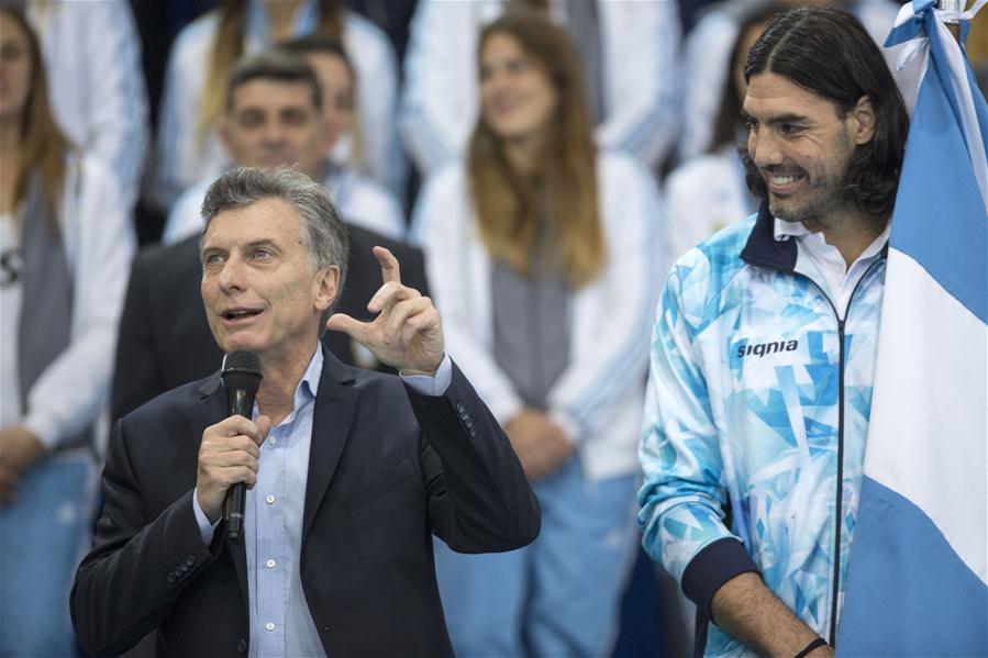 Argentine President Mauricio Macri (L) addresses next to the basketball player Luis Scola during the farewell ceremony of Argentine Olympic delegation to the Rio 2016 Olympic and Paralympic Games in Buenos Aires, Argentine, on July 11, 2016. 