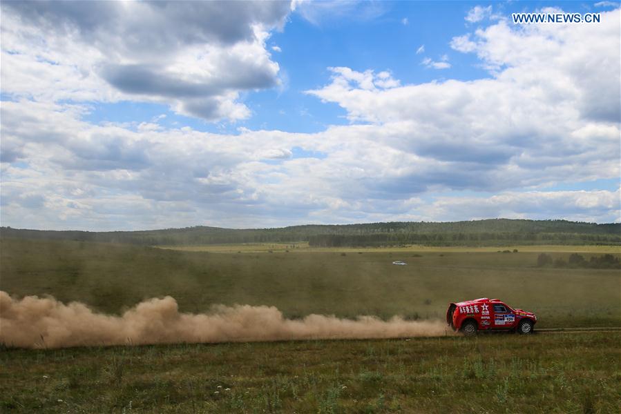 Ma Miao and Liao Min of Eastern Racing Team compete during the third stage of the Moscow-Beijing Silk Road rally 2016 in Ufa, Russia on July 11, 2016. 