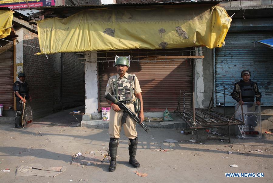 Indian paramilitary troopers patrol on a street during a curfew in Srinagar, summer capital of Indian-controlled Kashmir, July 13, 2016.