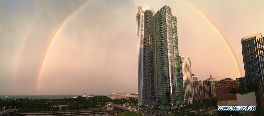 Photo taken on July 13, 2016 shows double rainbows above Lake Michigan in Chicago, the United States.