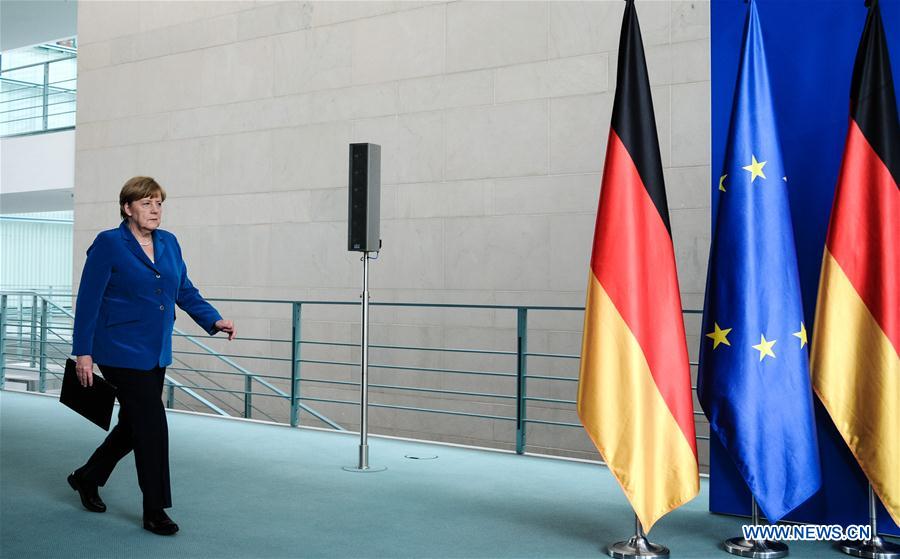 German Chancellor Angela Merkel arrives to attend a press conference in Berlin, capital of Germany, on July 23, 2016. 