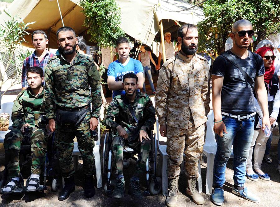 SYRIA-DAMASCUS-HONORING-CEREMONY-WOUNDED-SOLDIERS