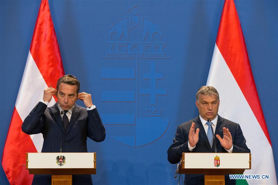  Hungarian Prime Minister Viktor Orban(R) shakes hands with Austrian Chancellor Christian Kern during a joint press conference after their meeting in Budapest, Hungary on July 26, 2016.