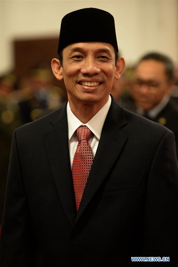 Indonesia's newly appointed Energy and Mining Minister Archandra Tahar poses for photos before the inauguration ceremony of new cabinet at the Presidential Palace in Jakarta, Indonesia, on July 27, 2016. 