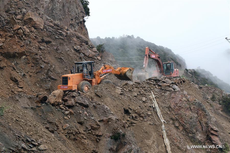 Traffic of the Juebashan section of Sichuan-Tibet highway, which was interrupted due to rain-triggered landslide, resumed Wednesday noon