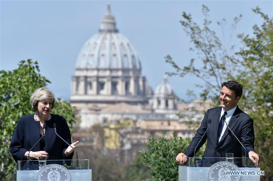 Italian Prime Minister Matteo Renzi (R) and his British counterpart Theresa May hold a joint press conference after their meeting in Rome, Italy, on July 27, 2016.
