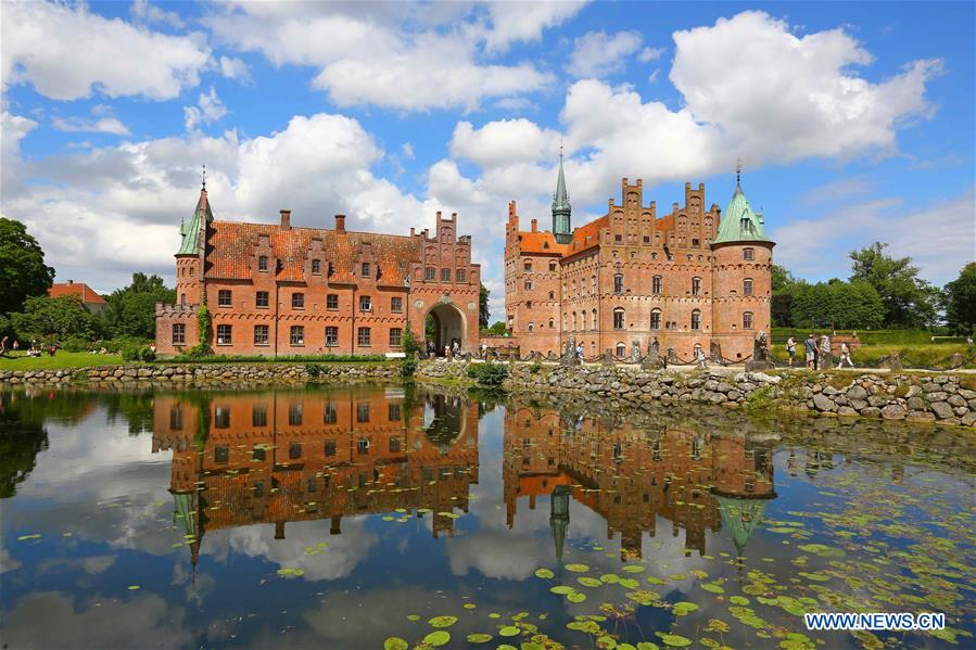 Photo taken on July 26, 2016 shows the moat of the Egeskov Castle in Funen, Denmark. Located in the south of the island of Funen, the Egeskov Castle was built by Frands Brockenhuss in 1554. 