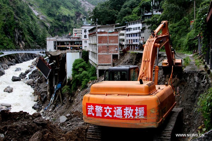 Traffic of the damaged Zham section of China-Nepal Highway resumed on Friday after the repair of Chinese armed transport police