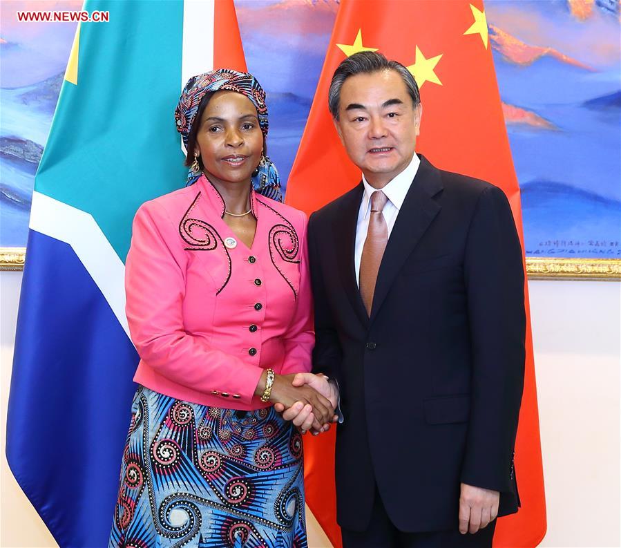 Chinese Foreign Minister Wang Yi (R) meets with South African International Relations and Cooperation Minister Maite Nkoana-Mashabane, who is here to attend the Coordinators' Meeting on the Implementation of the Follow-up Actions of the Johannesburg Summit of the Forum on China-Africa Cooperation (FOCAC), in Beijing, capital of China, July 29, 2016. (Xinhua/Ding Haitao)