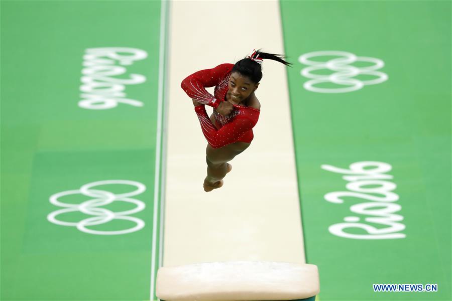 Simone Biles of the United States of America competes during the women's vault final of Artistic Gymnastics at the 2016 Rio Olympic Games in Rio de Janeiro, Brazil, on Aug. 14, 2016.