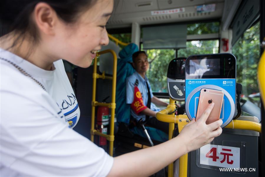 Passengers can buy tickets by scanning QR in Alipay on POS readers.