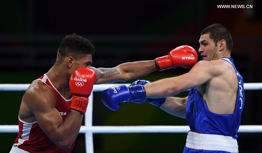 France's James Victor Tony Yoka (L) competes against Crotia's Filip Hrgovic during the men's super heavy(+91KG) semifinal of Boxing at the 2016 Rio Olympic Games in Rio de Janeiro, Brazil, on Aug. 19, 2016.