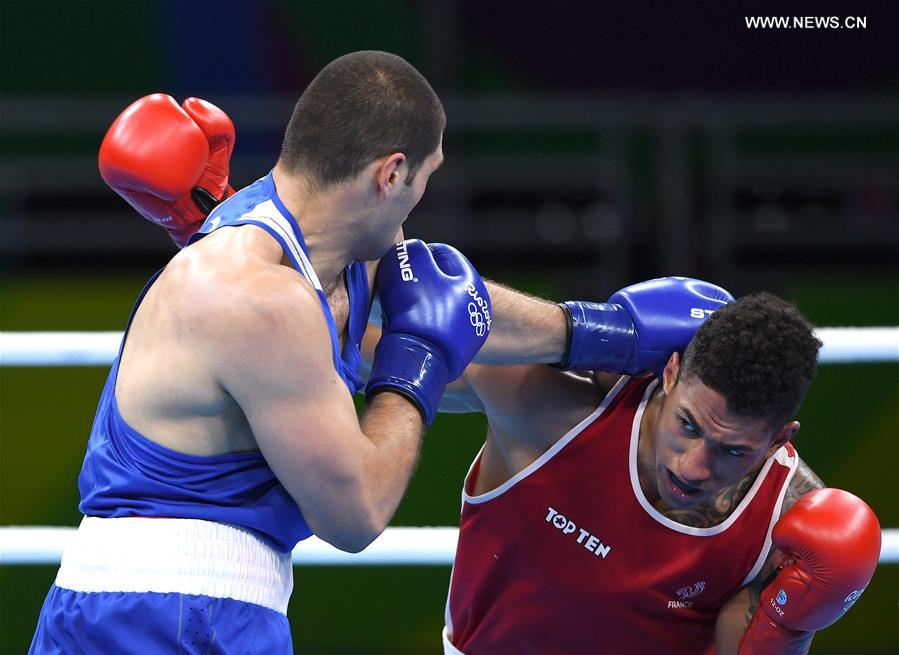 France's James Victor Tony Yoka (R) competes against Crotia's Filip Hrgovic during the men's super heavy(+91KG) semifinal of Boxing at the 2016 Rio Olympic Games in Rio de Janeiro, Brazil, on Aug. 19, 2016. 