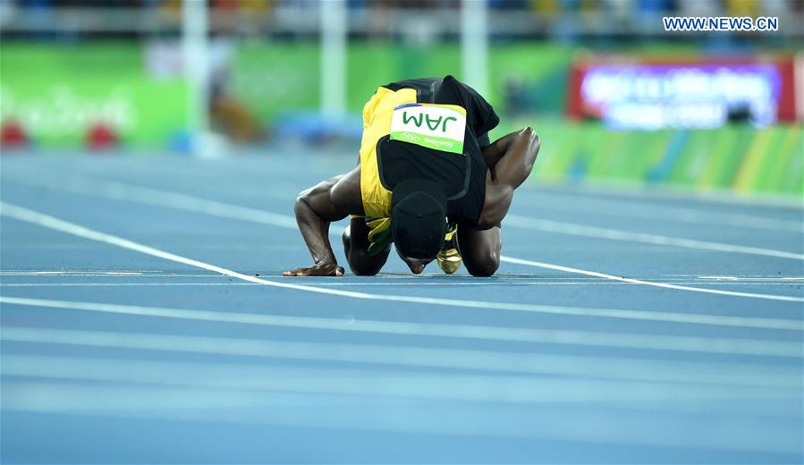 Jamaica's Usain Bolt celebrates after the men's 4x100m relay final of Athletics at the 2016 Rio Olympic Games in Rio de Janeiro, Brazil, on Aug. 19, 2016. 