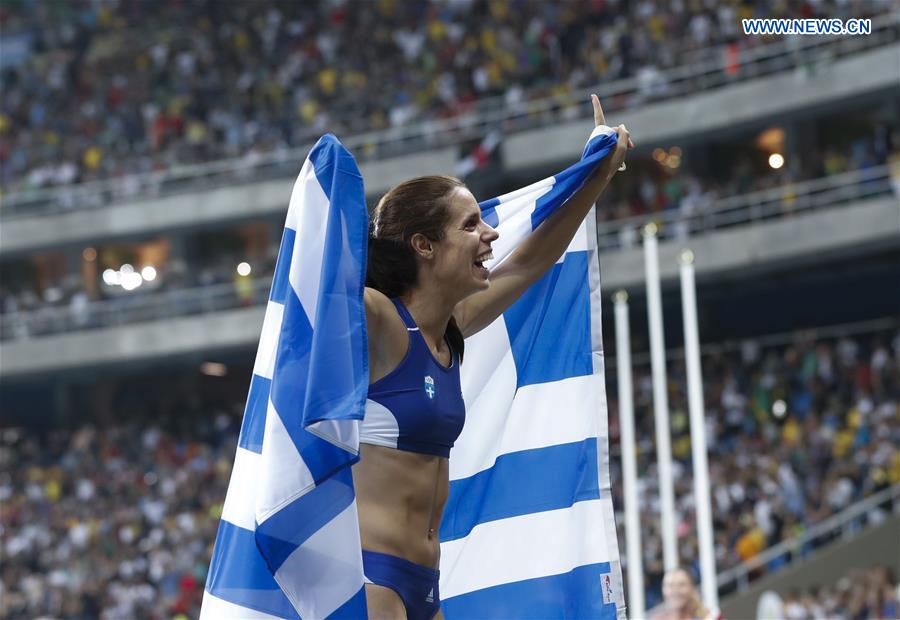 Greece's Ekaterini Stefanidi celebrates after the women's pole vault final of Athletics at the 2016 Rio Olympic Games in Rio de Janeiro, Brazil, on Aug. 19, 2016. 