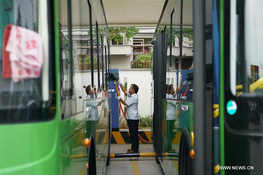 Fifty electric buses have been put into operation in Jingjiang recently. (Xinhua/Ji Chunpeng) 