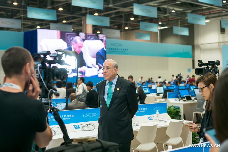 Organization for Economic Cooperation and Development Secretary-general Angel Gurria speaks to media at the Media Center for G20 Hangzhou Summit in Hangzhou, capital of east China's Zhejiang Province, Sept. 3, 2016.