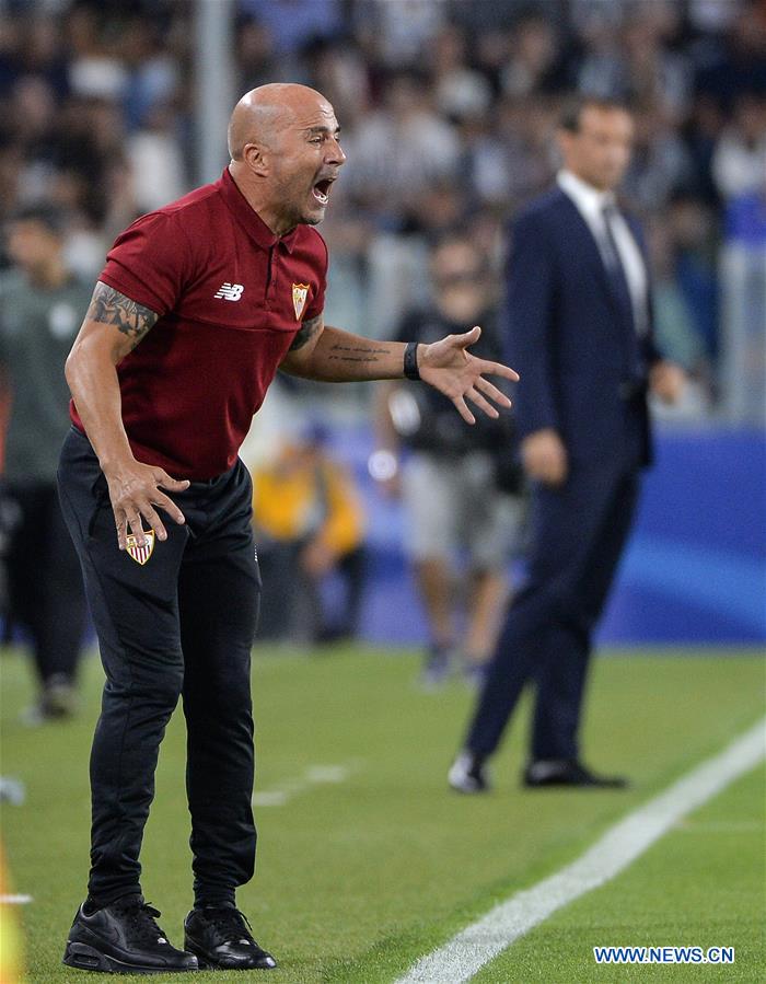 Sevilla's coach Jorge Sampaoli reacts during the UEFA Champions League soccer match against Juventus in Turin, Italy, Sept. 14, 2016.