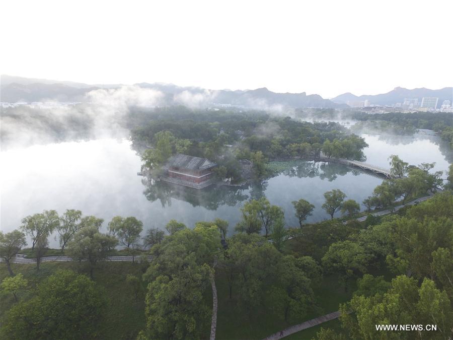 Photo taken on Sept. 20, 2016 shows the fog scenery at the Imperial Mountain Summer Resort in Chengde, north China's Hebei Province. 